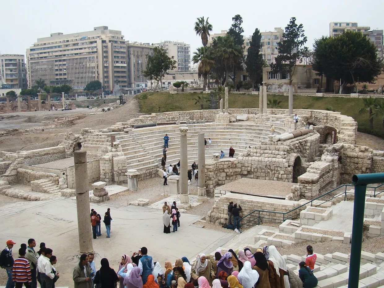 The Roman theatre at Kom El Dikka, curved rows of white marble seating.
